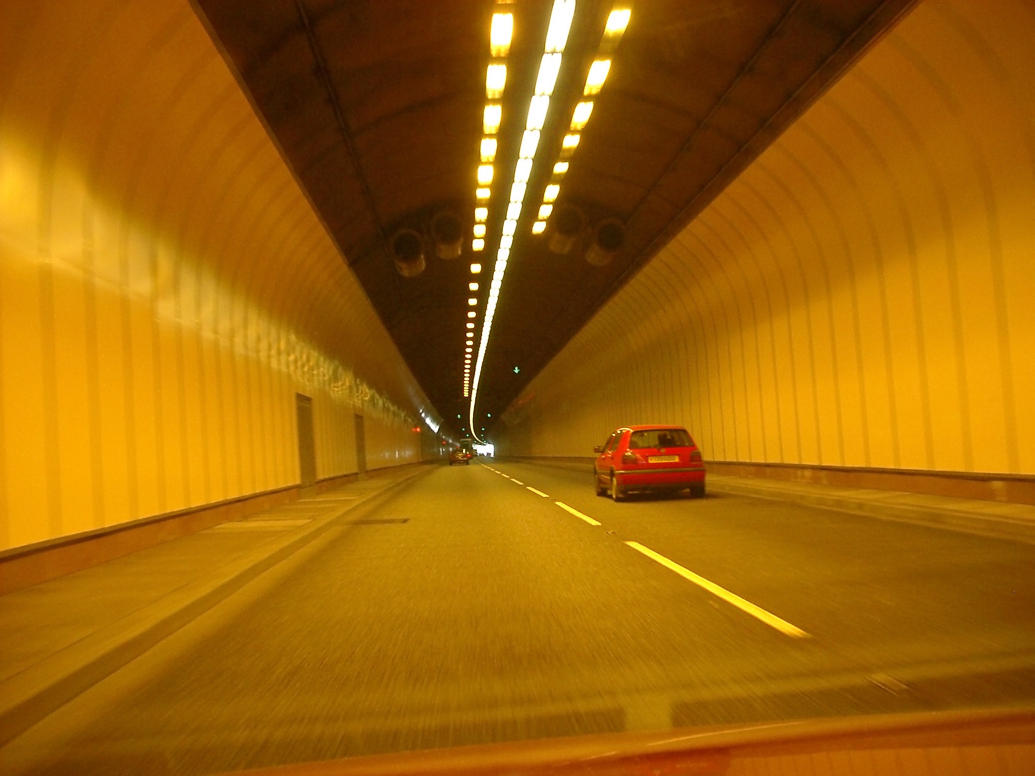 Car driving through a tunnel